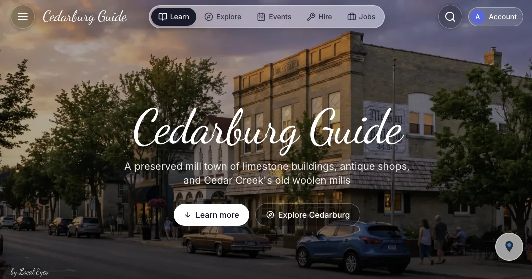 The Cedarburg Guide town page hero over a sunset street photo, with Learn more and Explore Cedarburg buttons